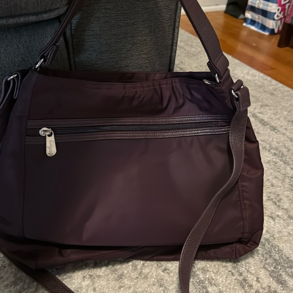 31 cross body bag. Deep burgundy wine color